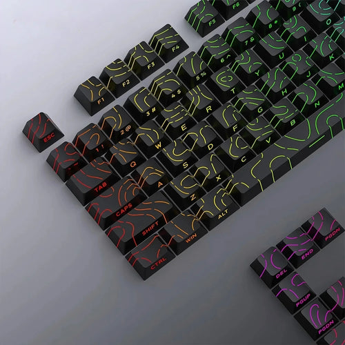 Keycaps PBT topográficas pretas com RGB passando pela legenda lateral
